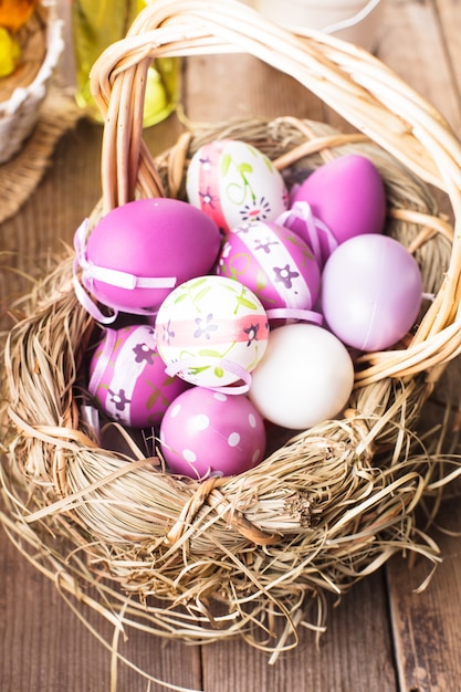 Easter purple eggs in basket