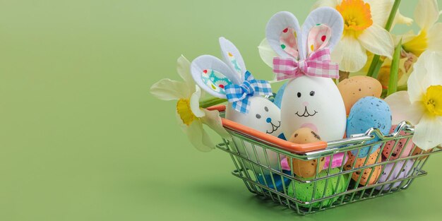 Photo easter sale concept shopping basket with festive symbols rabb