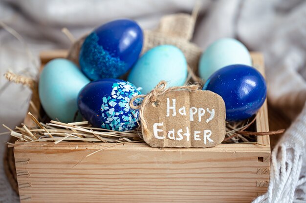 Easter still life with blue eggs, holiday decor