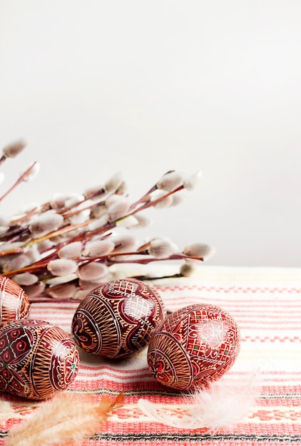 Easter still life with Pysanka on traditional Ukrainian cloth