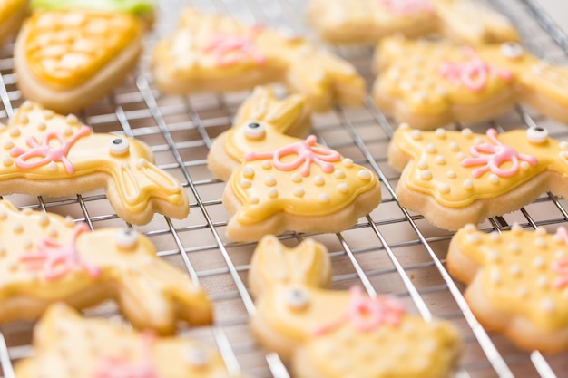 Easter sugar cookies decorated with royal icing of different colors.