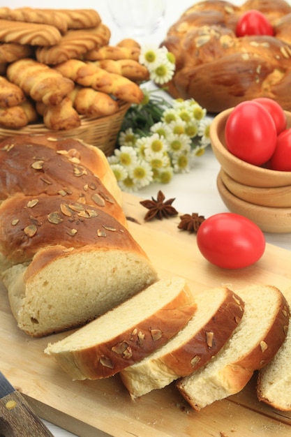 Easter sweet bread with red eggs and shortbread cookies