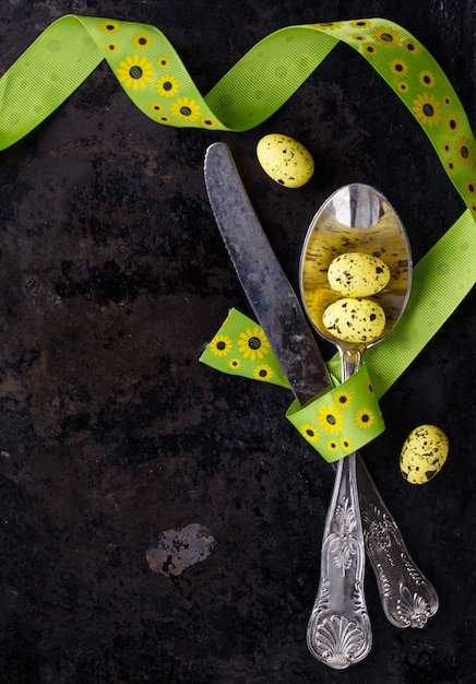 Easter table setting Cutlery,painted eggs,ribbon 