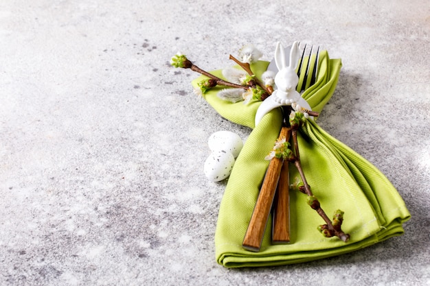 Easter table setting  on on gray background. 