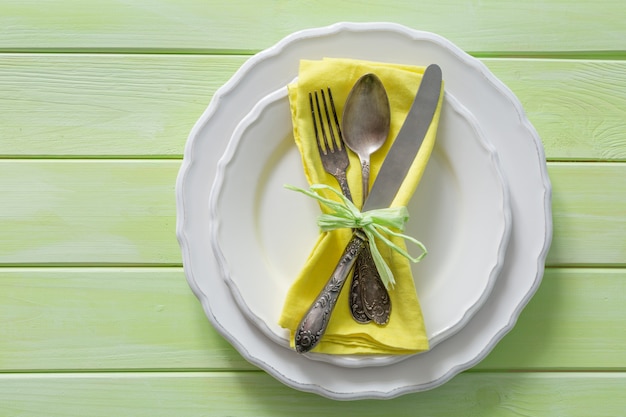 Easter table setting on wood