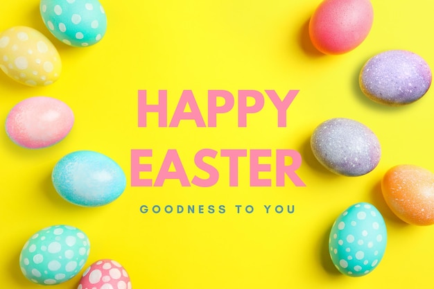 easter text happy easter with eggs on a yellow background