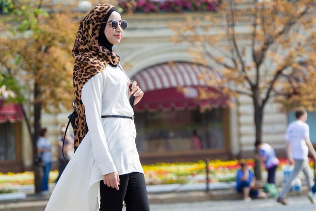 Eastern beauty in a scarf Girl in hijab on the street