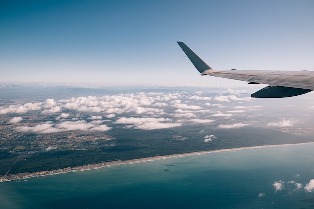 Eastern coast of italy and the sea view from the airplane window