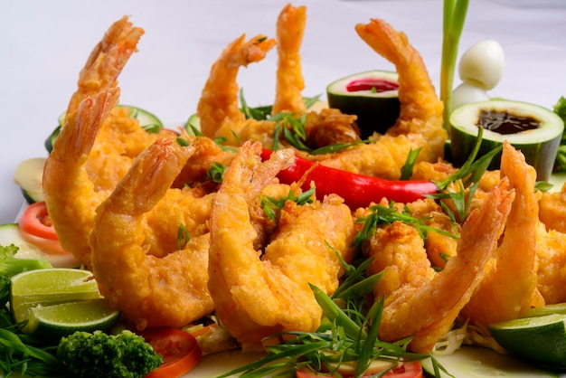 Eastern food Fried crispy shrimp with vegetables on white background