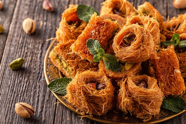 Eastern sweets on an old wooden table