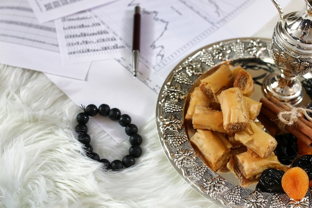 Eastern sweets table on a silver platter baklava and Tamarind snack at the workplace