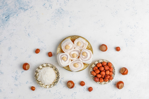 Photo eastern sweets.turkish delight,lokum with nuts,top view.