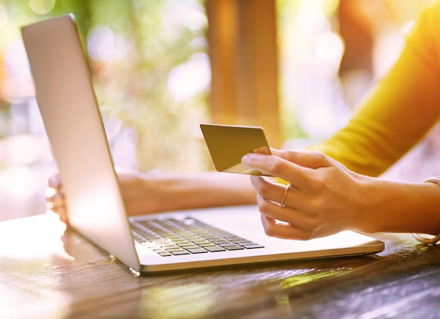 Photo easy access to her favorite products shot of an unrecognizable young woman shopping online