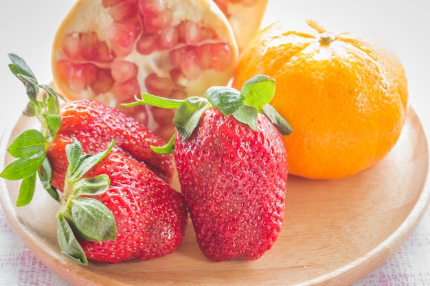 Easy meal mix fruit on wooden plate