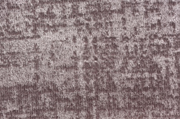 Легкий пестрый текстильный фон в стильном бежевом тоне