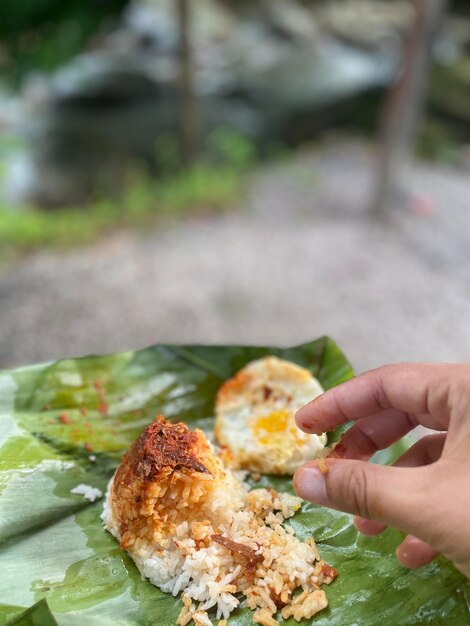 Eating nasi lemak