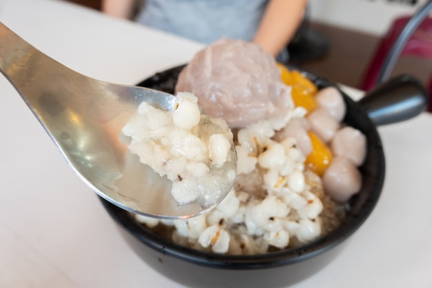 Eating shaved ice with colorful dessert, famous Taiwan snacks