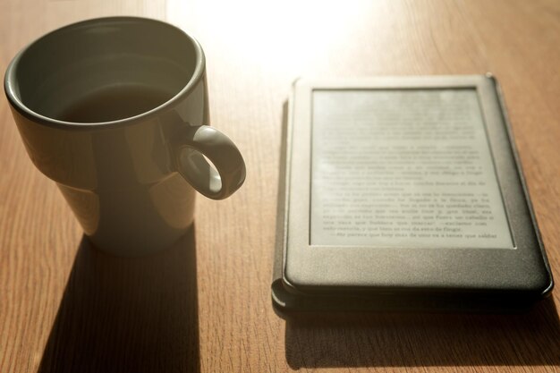 Ebook and coffee cup in the closeup