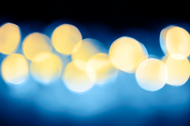 Echte bokeh lens achtergrond feestelijke gouden lichten defocus achtergrond