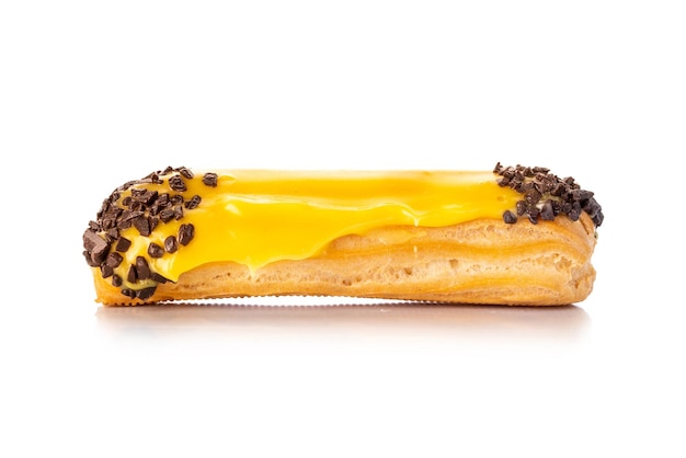 Photo eclair with yellow cream isolate on white background