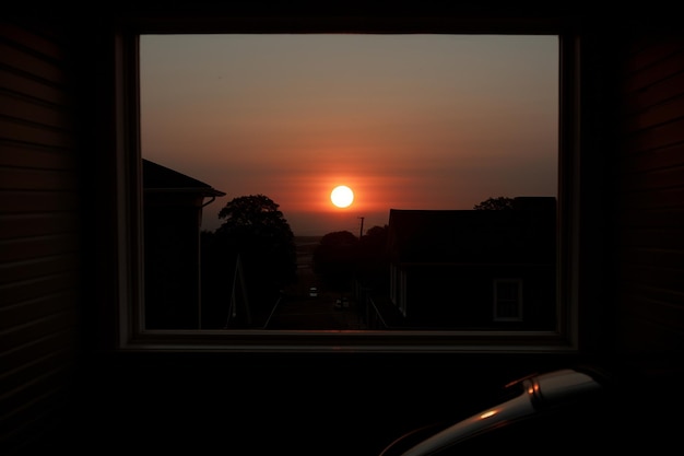 Eclipse Through Window Frame