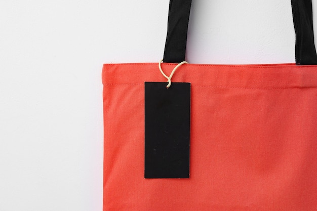 Eco bag for shopping with blank tag on white background