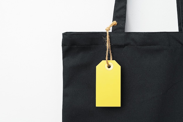 Eco bag for shopping with blank tag on white background