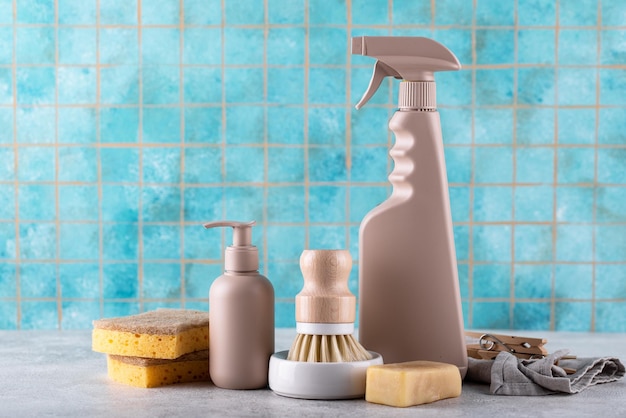 Eco cleaning with bottles brushes and sponges