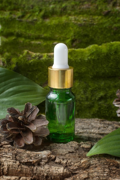 Eco cosmetic product for skin care Natural serum in glass cosmetic bottle with oils aloe vitamins