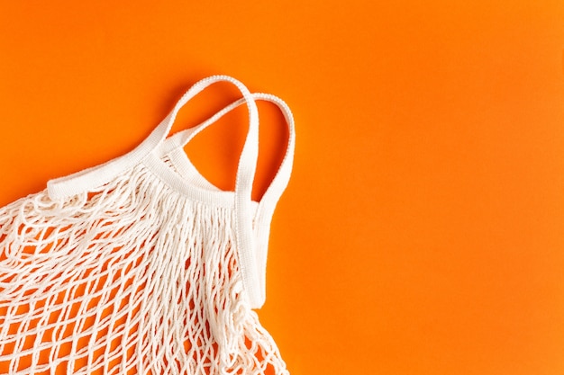 Eco friendly bag on orange background