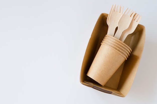 Eco-friendly biodegradable cardboard or paper dishes. Zero waste recycling concept.