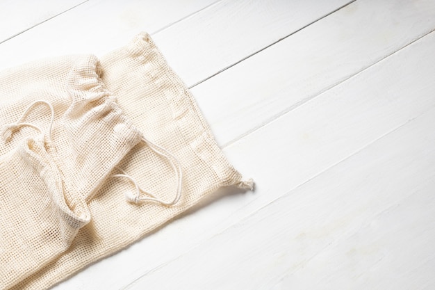 Eco-friendly cotton bags on white background