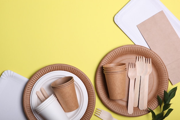 eco friendly dishes on a colored background top view ecofriendly
