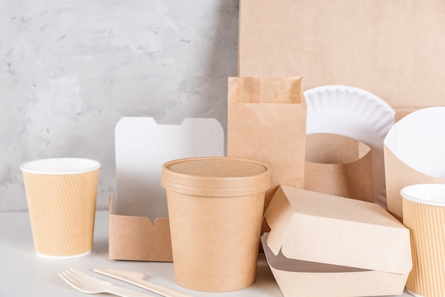 Eco friendly disposable tableware. Paper cups, dishes, bag, fast food containers and bamboo wooden cutlery