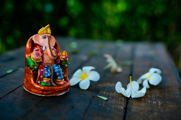 Eco friendly Ganesha idol or statue home made selective focus