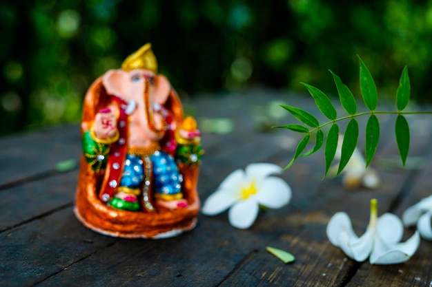 Eco friendly Ganesha idol or statue home made selective focus