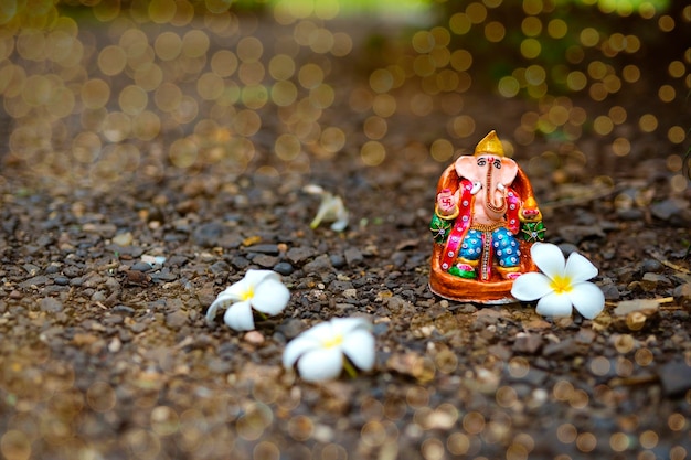 Photo eco friendly ganesha idol or statue home made selective focus