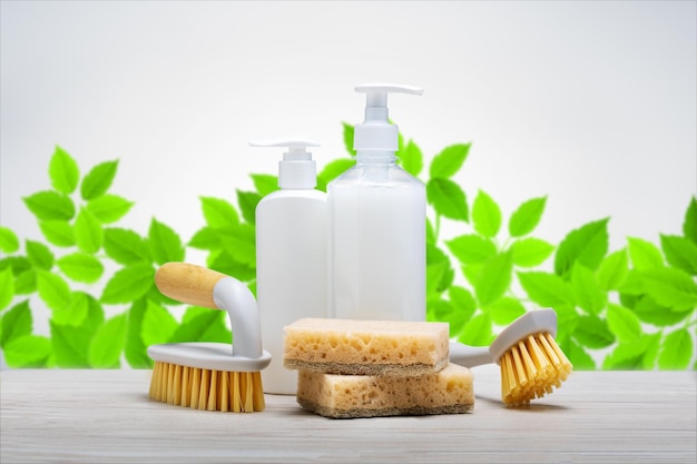 Eco friendly natural cleaners cleaning products on green leaves background