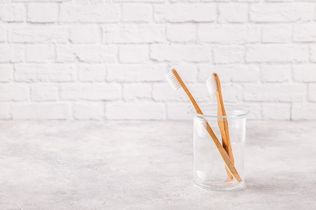 Eco-friendly toothbrushes in a glass