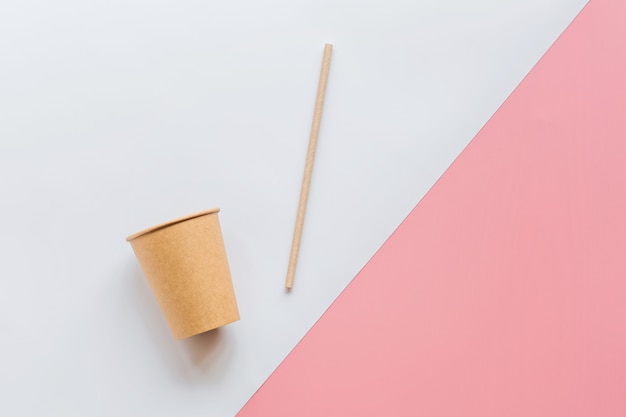 Eco natural paper coffee cup and straw