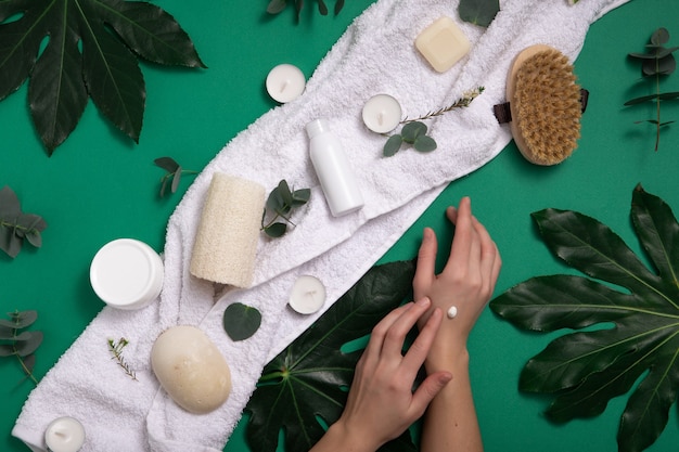 Eco organic cosmetics on a green background