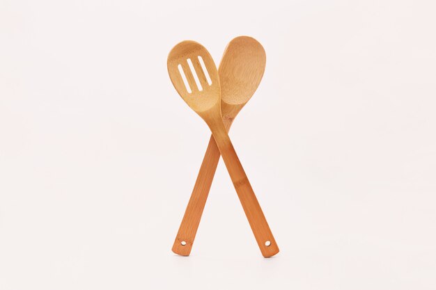 Ecological wooden cutlery on white