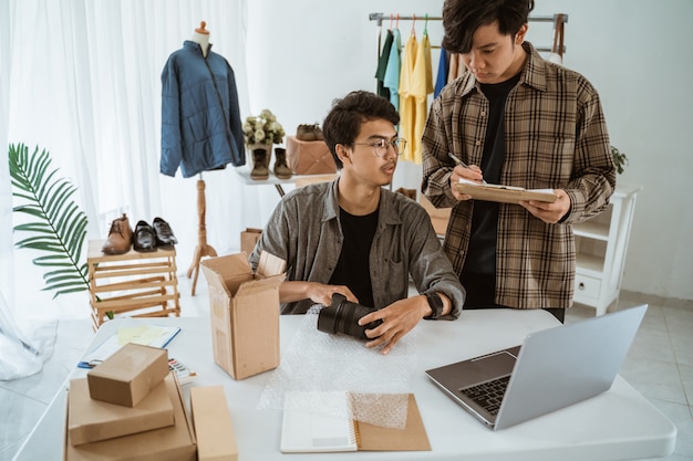 Ecommerce team working together in a clothing store