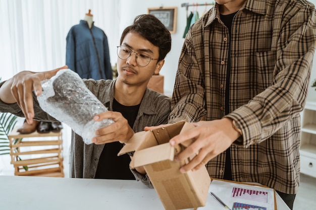 Ecommerce team working together in a clothing store