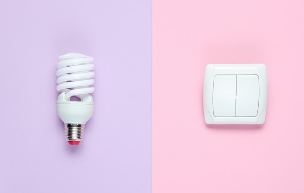 Economy light bulb, switch. Top view. Minimalism electro consumer concept