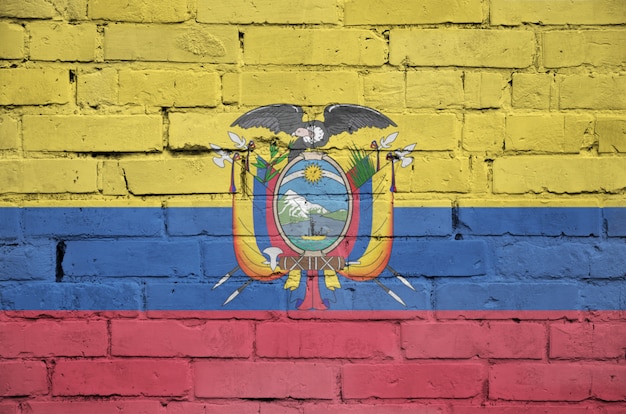 Ecuador flag is painted onto an old brick wall