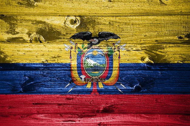 Ecuador flag on wooden planks background wood flag