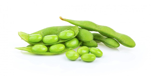 Edamame beans on white wall. 