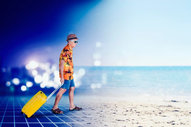 Ederly man carrying suitcase on the virtual beach