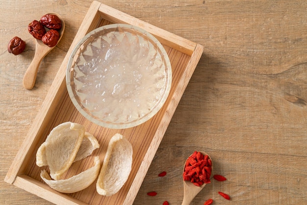 Edible bird's nest soup in glass bowl